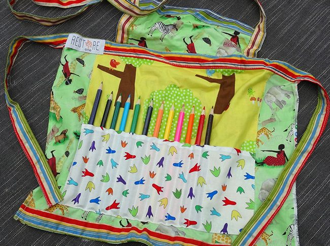 Childs apron with pencils in jungle print
