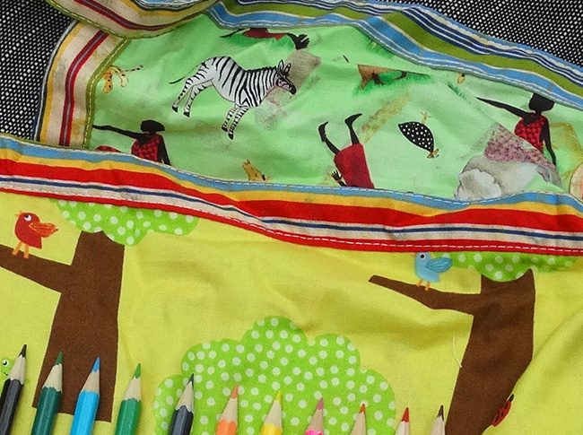 Childs apron with pencils in jungle print