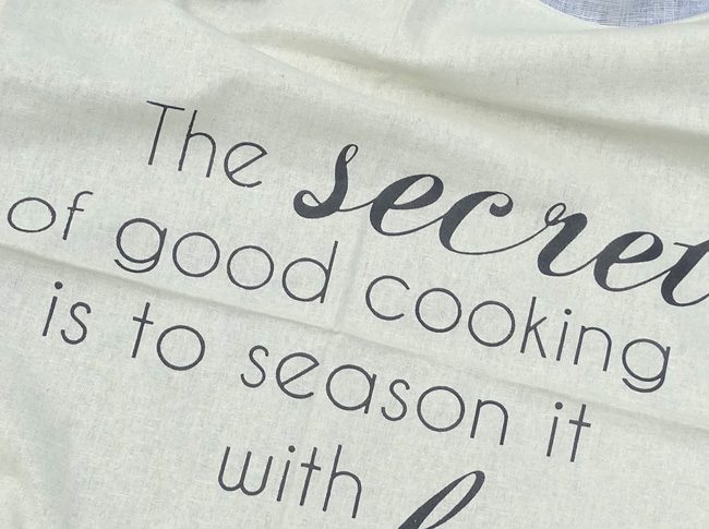 Tea Towel: The secret to good cooking is to season it with love