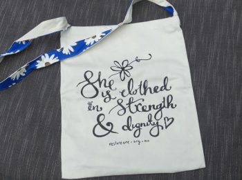 She is clothed in strength and dignity - Tote bag