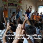 Happiness is a friend who will dance with you