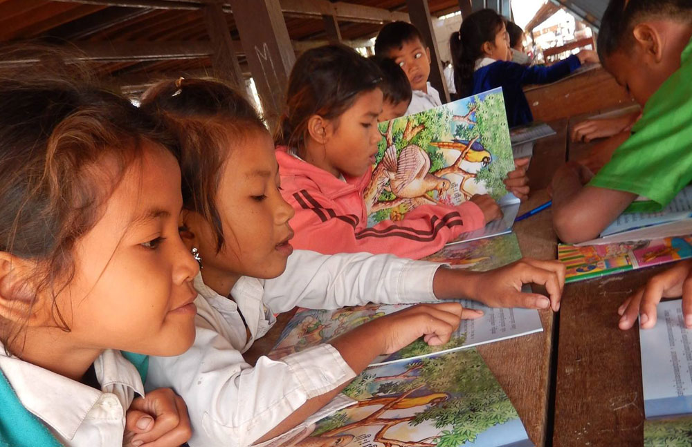 Restore One Primary School kids learning to read