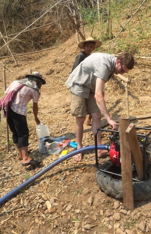 Installing the pump to bring water from the river to the tank