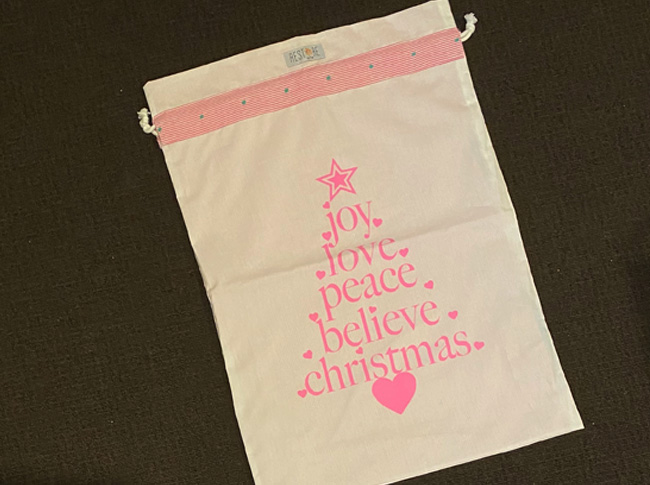 Santa sacks with pink writing